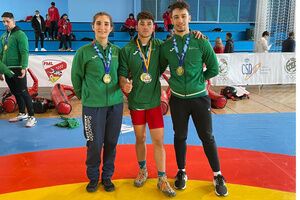 Manolo Muñoz, Adrián Domínguez y Marta Jiménez, Campeones de España de Lucha